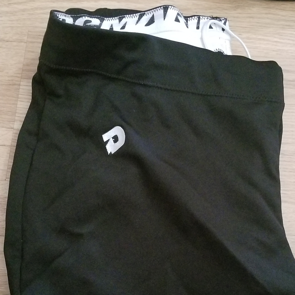 6 pair of softball pants